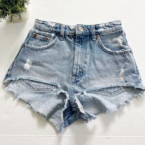 Zara High Waist Distressed Hem Shorts in Medium Wash
